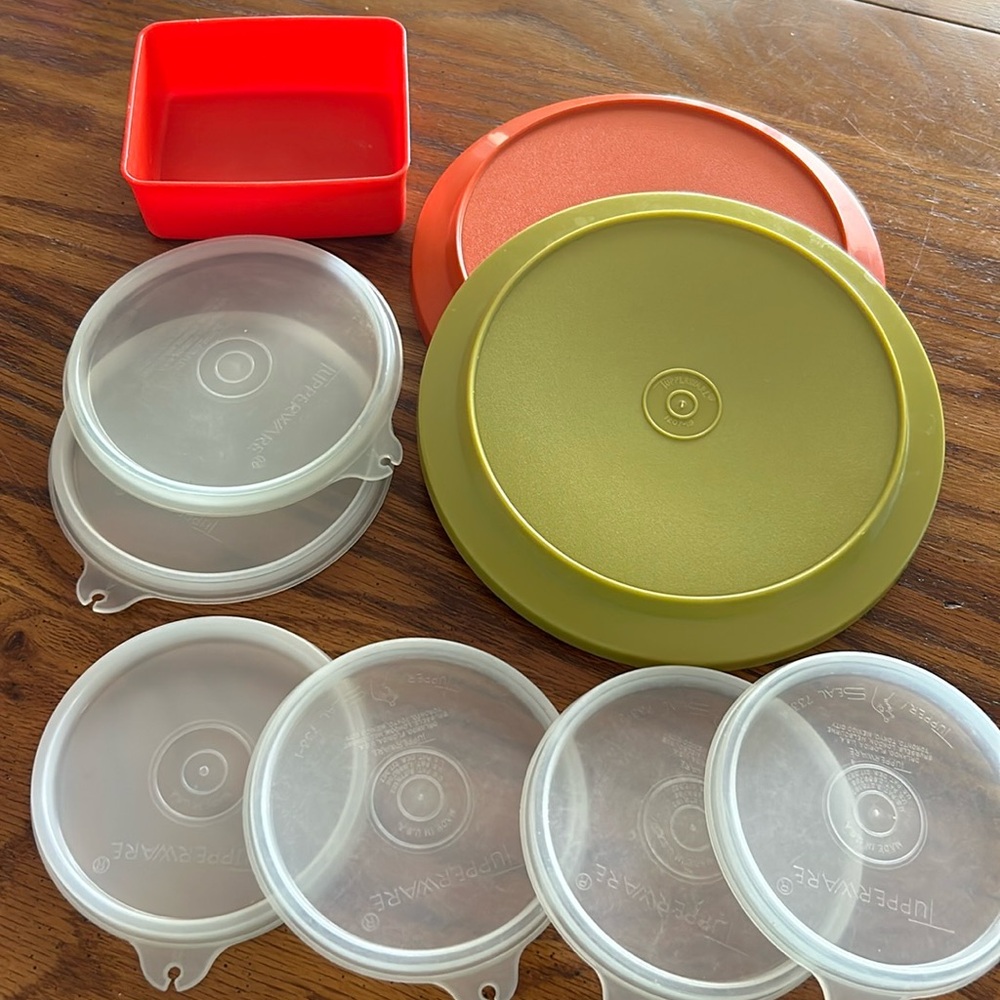 Tupperware lot of nine lids for Tupperware containers/bowls .